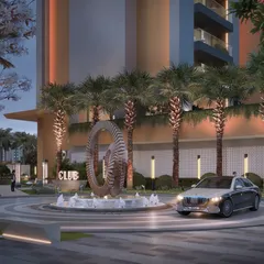 The entrance to the Gulnar Zenium club is designed to be a landmark. A modern ring sculpture and water feature create a dynamic roundabout, signaling the transition into a space of elevated living and contemporary design.