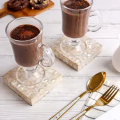 Cozy and comforting hot chocolate, styled for a cafe menu with a bright and airy feel.