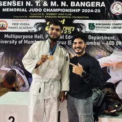 A moment of pride. Our coach with one of our medal-winning fighters. Every victory is a team victory.