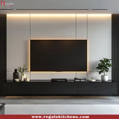This sleek black TV unit features a marble-patterned back panel and subtle under-lighting. The minimalist design keeps the focus on the screen while providing ample storage.