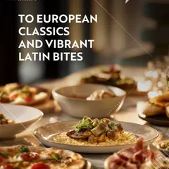 A table at one8 Commune, laden with European classics and vibrant Latin bites. This image shows a variety of dishes, including artisanal pizza and risotto, perfect for a shared dining experience with friends or family.
