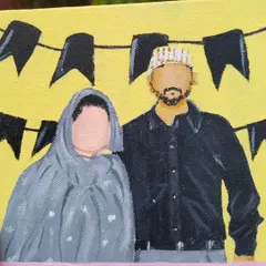A close up of one of the panels from the family collage, showing a festive moment.