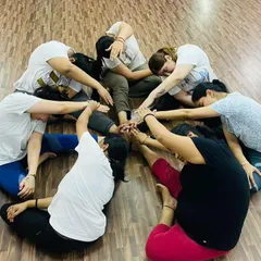 We grow stronger together. This group circle stretch is a perfect example of how we use partner work to deepen our practice, improve flexibility, and build a strong sense of community in the studio.