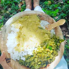 A simple, nourishing meal of rice, vegetables, and legumes served on a leaf plate at the Isha Yoga Center. Eating in this way, close to nature, makes you more sensitive to the food you consume and how it affects your system. It is a practice in mindfulness itself.