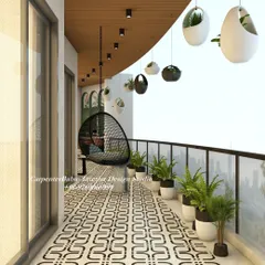 This long balcony features a beautiful patterned floor, a comfortable swing, and hanging planters, creating a green and inviting escape from the city.