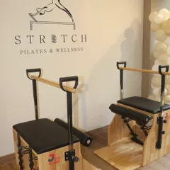 A close-up of our stability chairs and the studio logo. We have a variety of equipment to keep your workouts challenging and fresh.