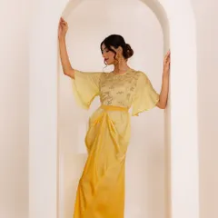 Another pose from the yellow dress shoot, showing the full silhouette. This look is perfect for a festive brunch or a day event.