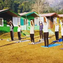 Morning stretches at our Rishikesh yoga retreat. We start our day by saluting the sun and soaking in the peaceful energy of the Himalayas.