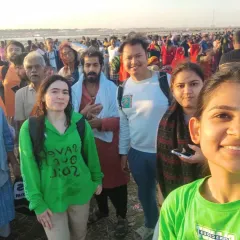 Our group amidst the vast crowd at the Kumbh Mela. The energy is overwhelming and intense, a true immersion into the heart of devotion.