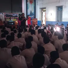 A member of our team addresses a hall full of students during our awareness campaign in Gokarna. We discuss everything from rabies prevention to the importance of sterilization to build a safer community for both people and animals.