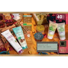 A festive gifting layout for various Oriflame skincare scrubs and lotions. The warm lighting and traditional props are used to evoke a celebratory mood, encouraging seasonal purchases.