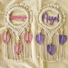 A lovely pair of macrame name hangings for 'Sanaya' and 'Aizel'. These are perfect for a shared kids' room, with each piece customized in their favorite color.