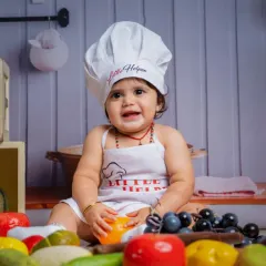 Sweetness overload with fruit and a whole lot of love. This little chef is ready to cook up a storm.