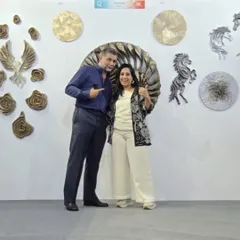 So much fun and energy at the Qatar exhibition. Sharing a moment with a new friend and admirer of my work.