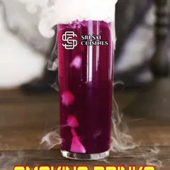 This deep purple smoking drink shows the visual versatility of the dry ice effect. It's a simple addition that dramatically elevates the presentation of any beverage, making it perfect for themed parties or elegant receptions.