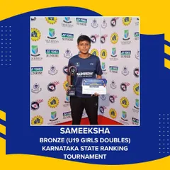 Sameeksha, a winner at the Karnataka State Ranking Tournament, proudly displays her trophy and certificate. We celebrate the achievements of every player, providing a platform for them to shine.