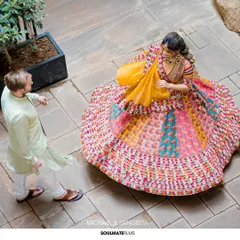 The twirl of a vibrant lehenga against ancient stone. This shot captures the energy, color, and celebration at the heart of an Indian love story. I use dynamic angles like this to bring life and movement to our portraits, making them feel alive.