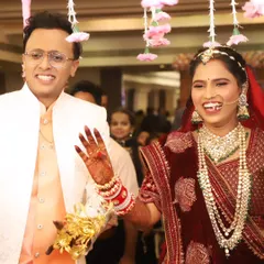The joy of a bride's grand entrance. Her makeup is designed to be picture-perfect from every angle, capturing her happiness and radiance.