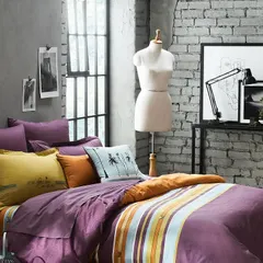 The "after" shot of a perfectly made bed in a "His & Her" collection. This establishes the aesthetic of the collection before we introduce the human element, showing the product in its ideal state.