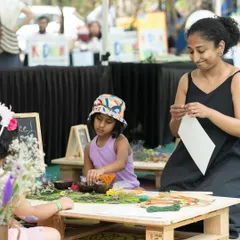 A candid moment from our nature crafts workshop. Using natural materials like leaves and flowers, children get to connect with nature and create something beautiful. It’s a calm, creative corner amidst the buzz of the market.