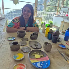 Here are my pottery pieces in their raw, unglazed form at the studio. I love the natural, earthy look of the clay before it's fired and glazed.