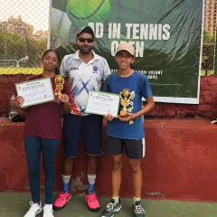 The winner and runner-up from a junior girls' category at the Ad In Tennis Open. These young players showed fantastic sportsmanship and skill.