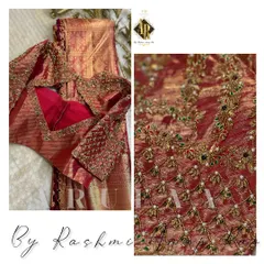 A closer look at the craftsmanship on a maroon bridal blouse. The design combines a lattice pattern with delicate floral motifs, with each pearl and stone meticulously hand-stitched.