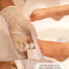 Gentle preparation is key, especially for children. I handle the filing and prep work slowly and with great care to ensure the entire process is comfortable and relaxing.
