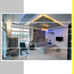 The master bedroom interior, designed for ultimate comfort and style. The combination of a high-back wing chair, a modern rocking chair, and strategic mood lighting creates a sophisticated yet relaxing atmosphere.