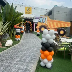 A giant dumper truck prop adds a huge wow factor to our construction-themed parties. We believe in going big with our props to make the experience truly memorable.