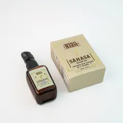 A product and packaging shot for a men's beard oil. Showing the box alongside the bottle is crucial for e-commerce as it displays the full retail product.
