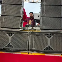 A straight-on shot of my mobile baraat setup. You can see the Pioneer controller and laptop, all housed within a massive wall of speakers ready to bring the noise.