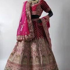 This hot pink bridal lehenga with light pink embroidery is a perfect choice for the modern bride. You can see the full detail and craftsmanship in this shot.