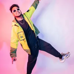 It's all about the pose and the attitude. This look, with the neon jacket and white shades, is part of the Skelltron signature style.