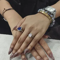 Here’s a look at my popular Cat Eye nail extensions. The magnetic polish creates a unique, shifting shimmer on these sharp stiletto nails, giving them a deep and dramatic effect that changes with the light.