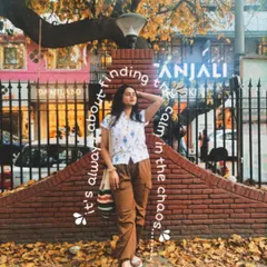 Finding the calm in the chaos of Delhi with a comfy and stylish outfit. This look, featuring cargo pants and a quirky shirt, is perfect for a day of exploring and shopping in Khan Market.