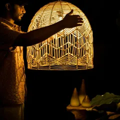 To give you a sense of scale, here I am with one of my larger, more intricate dome-shaped creations. Each piece is a labor of love, designed to be a significant, artful presence in your home or commercial space.