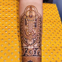 Govinda! This intricate arm design features a full figure of Shree Balaji, also known as Govinda. It is a work of pure devotion, filled with fine details and spiritual energy.
