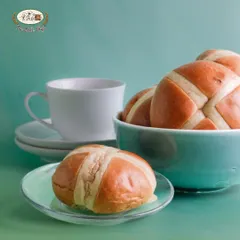 Our traditional hot cross buns are an Easter essential. These soft, spiced sweet buns are marked with a cross and are perfect when served warm with butter.