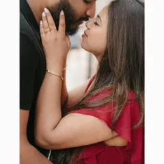A tender moment between Akhil and Merlin. This close-up from their London pre-wedding shoot focuses on the gentle touch and near-kiss, highlighting the deep affection and romance of their story.
