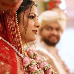 A beautiful candid moment from the ceremony. Notice how the makeup looks soft and defined, not heavy, even in professional photos.