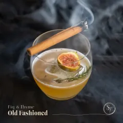 I give as much thought to my cocktails as I do to my food. This is my Fig & Thyme Old Fashioned, made with a house-made fig jam, pecan coffee bitters, and a smoked cinnamon stick for an aromatic, multi-sensory drink experience.