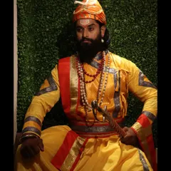A full-length portrait capturing the traditional attire and regal pose of a model for a Shivaji Maharaj Jayanti photoshoot.