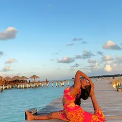 Another pose from the Maldives, this time a variation of Hanumanasana (the splits) with a backbend.