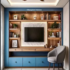 I used a bold blue for the lower cabinets to add a pop of color to this living room. The TV is set against a backlit marble-effect panel, framed by wooden shelves that provide balanced, symmetrical storage.