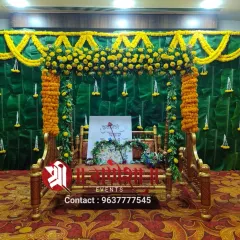 For families who love a traditional look, I design Dohale Jevan decorations like this one. The backdrop is made with real banana leaves and decorated with fresh marigold flowers for an authentic feel.