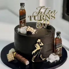 Crafted for a milestone that deserves more than the ordinary. This Johnnie Walker themed cake for a 50th birthday features bold black tones, golden accents, and classic indulgences.