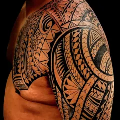 A full sleeve and chest tattoo in a dense Polynesian style. This kind of large-scale work requires many hours of dedication from both the client and me to achieve a perfect result.