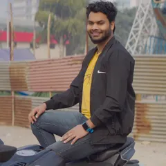 A side-profile shot of the model sitting on the bike. This provides a different angle and a more candid feel.