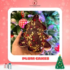 The holiday season isn't complete without the taste of a classic plum cake. Our Christmas tree-shaped plum cake, rich with fruits and nuts, is a festive favorite that brings the magic of the season to your dessert table.